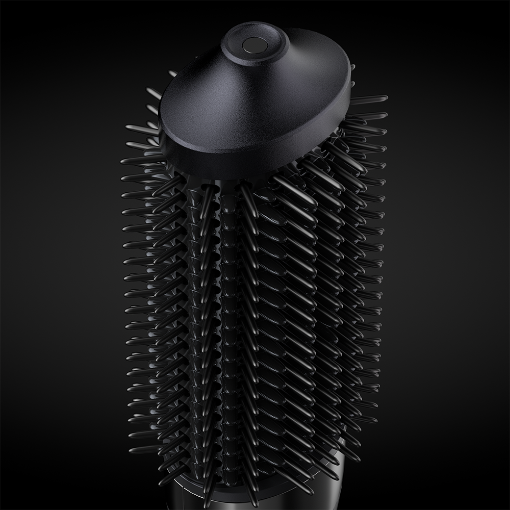 Close-up of ceramic heated bristles on round blow dryer brush
